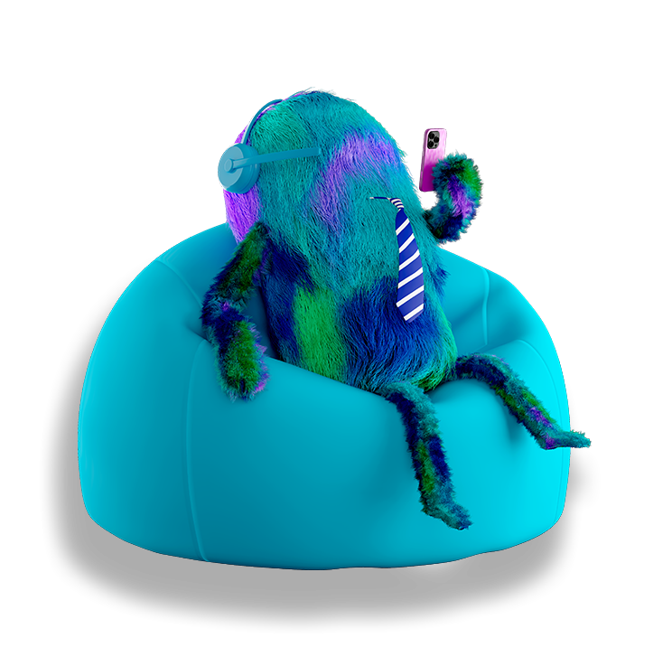 Lanny relaxing in a beanbag while using a phone